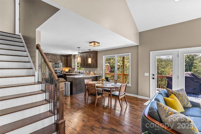 2508 Wolf Pit Rd, Morganton, NC 28655 - dining room with dark wood-style floors, stairway, baseboards, recessed lighting, and lofted ceiling