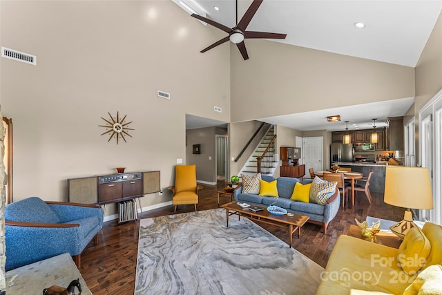 2508 Wolf Pit Rd, Morganton, NC 28655 - living room featuring stairs, ceiling fan, high vaulted ceiling, wood finished floors, and baseboards