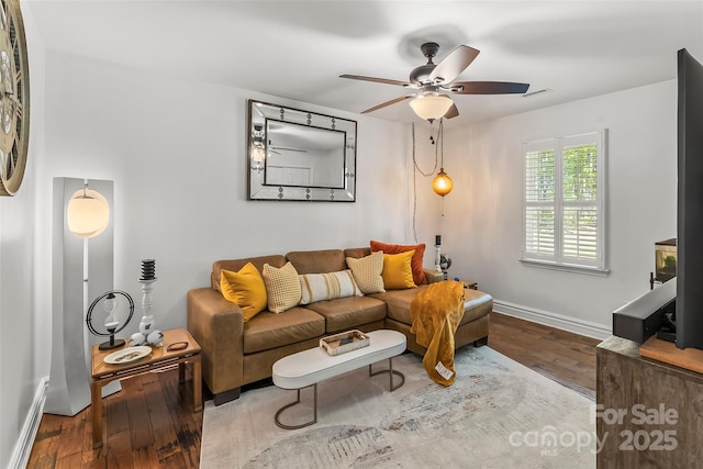 2508 Wolf Pit Rd, Morganton, NC 28655 - living area featuring a ceiling fan, wood finished floors, and baseboards