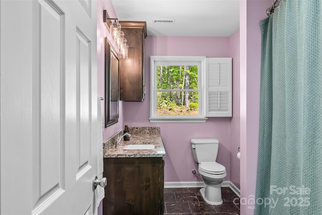 2508 Wolf Pit Rd, Morganton, NC 28655 - full bath featuring vanity, toilet, baseboards, and a shower with shower curtain