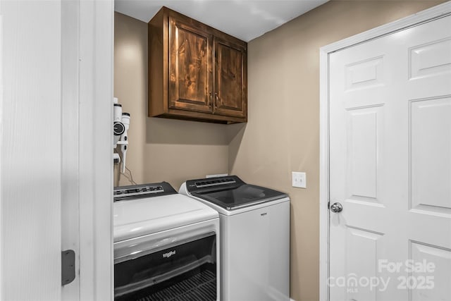2508 Wolf Pit Rd, Morganton, NC 28655 - laundry room with cabinet space and washing machine and clothes dryer