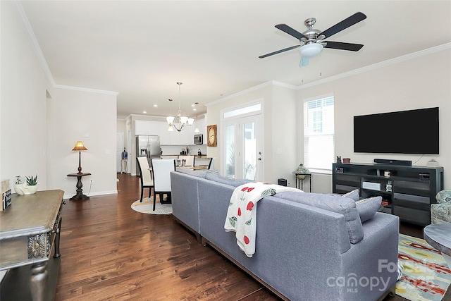 109 Mac Aly, Cramerton, NC 28032 - living room featuring a chandelier, ornamental molding, dark wood-type flooring, a ceiling fan, and baseboards