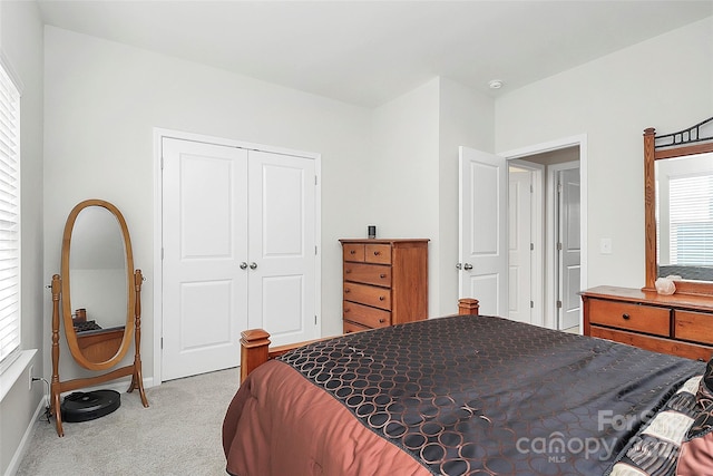 109 Mac Aly, Cramerton, NC 28032 - bedroom featuring light colored carpet, a closet, and baseboards