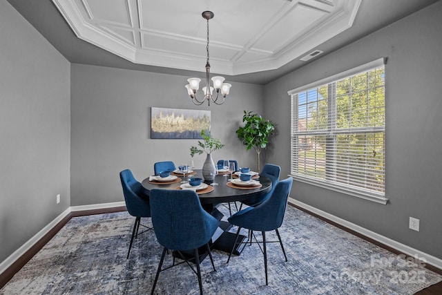 1035 Ivey Ct, Indian Land, SC 29707 - dining space featuring baseboards, coffered ceiling, a chandelier, wood finished floors, and ornamental molding