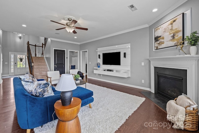 1035 Ivey Ct, Indian Land, SC 29707 - living room with stairs, recessed lighting, baseboards, crown molding, and dark wood-style floors