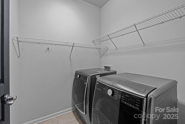 1035 Ivey Ct, Indian Land, SC 29707 - washroom with washer and clothes dryer and light tile patterned flooring