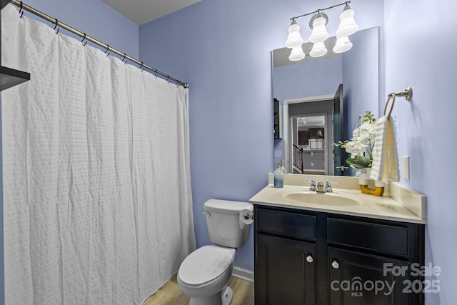 1035 Ivey Ct, Indian Land, SC 29707 - bathroom featuring toilet, vanity, wood finished floors, and a shower with curtain