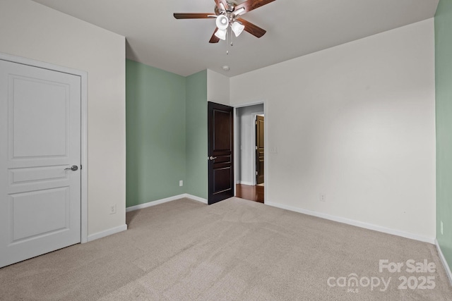 1035 Ivey Ct, Indian Land, SC 29707 - unfurnished bedroom featuring carpet floors, baseboards, and ceiling fan