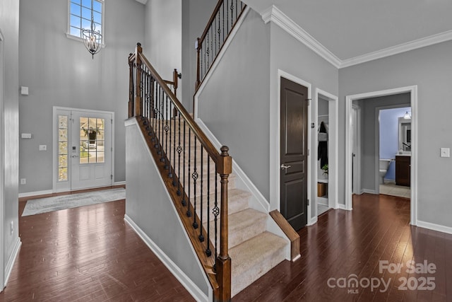 1035 Ivey Ct, Indian Land, SC 29707 - stairs with wood-type flooring, crown molding, and baseboards