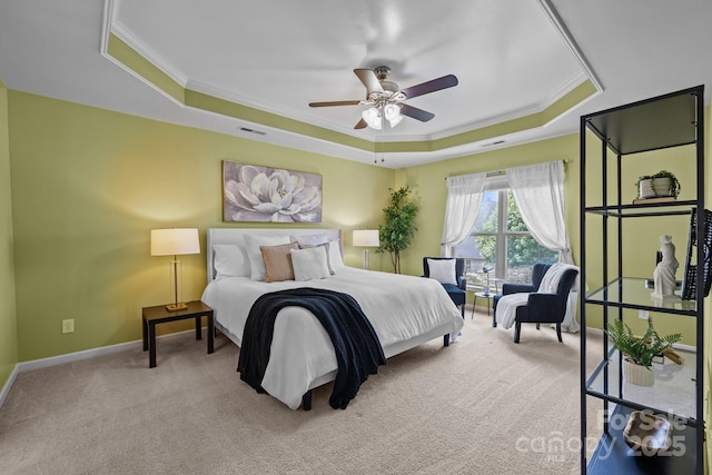 1035 Ivey Ct, Indian Land, SC 29707 - carpeted bedroom featuring a raised ceiling, crown molding, baseboards, and ceiling fan