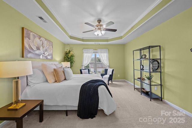 1035 Ivey Ct, Indian Land, SC 29707 - bedroom featuring a raised ceiling, carpet floors, crown molding, ceiling fan, and baseboards