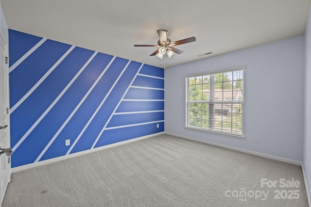 1035 Ivey Ct, Indian Land, SC 29707 - carpeted spare room with ceiling fan, baseboards, and built in features