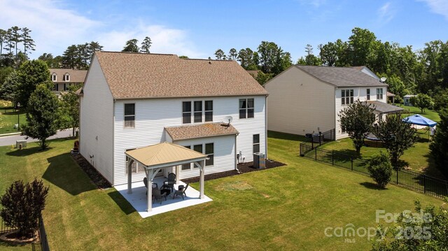 1035 Ivey Ct, Indian Land, SC 29707 - rear view of house with a gazebo, a patio, and roof with shingles