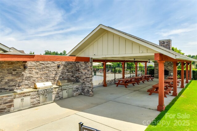 1035 Ivey Ct, Indian Land, SC 29707 - view of community with an outdoor kitchen, a patio area, and a gazebo