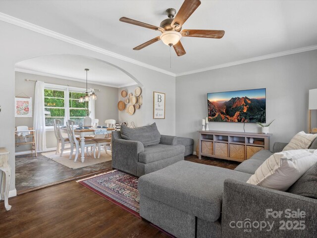 2451 Robert H Kirk Rd, Lancaster, SC 29720 - living area with wood finished floors, ceiling fan, crown molding, arched walkways, and a chandelier