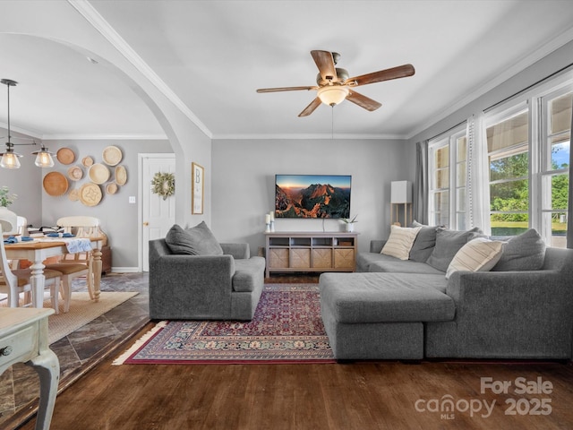 2451 Robert H Kirk Rd, Lancaster, SC 29720 - living area featuring a ceiling fan, arched walkways, crown molding, wood finished floors, and baseboards