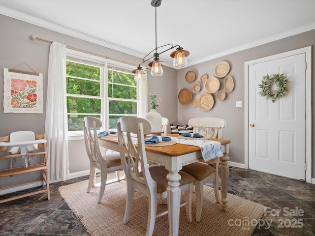 2451 Robert H Kirk Rd, Lancaster, SC 29720 - dining area with ornamental molding, dark stone finish floors, and baseboards