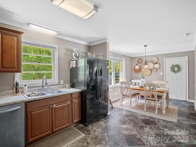 2451 Robert H Kirk Rd, Lancaster, SC 29720 - kitchen with stainless steel dishwasher, a sink, black fridge with ice dispenser, light countertops, and crown molding