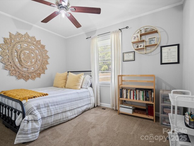 2451 Robert H Kirk Rd, Lancaster, SC 29720 - carpeted bedroom with crown molding, baseboards, and a ceiling fan