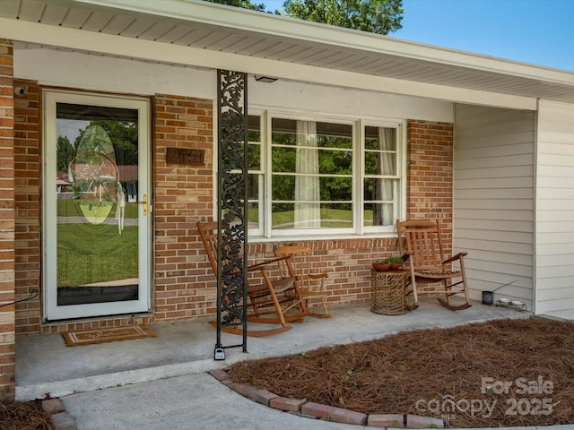 2451 Robert H Kirk Rd, Lancaster, SC 29720 - property entrance with a porch and brick siding