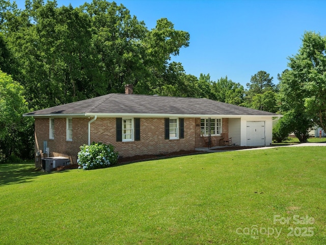2451 Robert H Kirk Rd, Lancaster, SC 29720 - ranch-style home featuring brick siding, a garage, a front lawn, and cooling unit