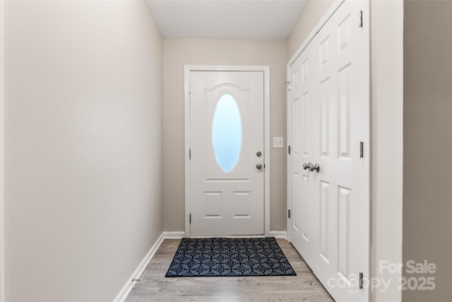 9651 Bailey Rd, Cornelius, NC 28031 - entryway with light wood-style floors and baseboards