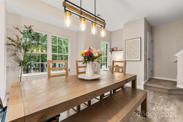 9651 Bailey Rd, Cornelius, NC 28031 - dining area featuring plenty of natural light and baseboards