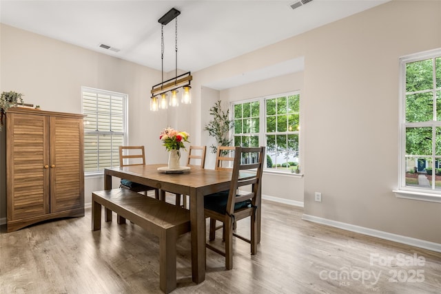 9651 Bailey Rd, Cornelius, NC 28031 - dining area with light wood-style floors and baseboards