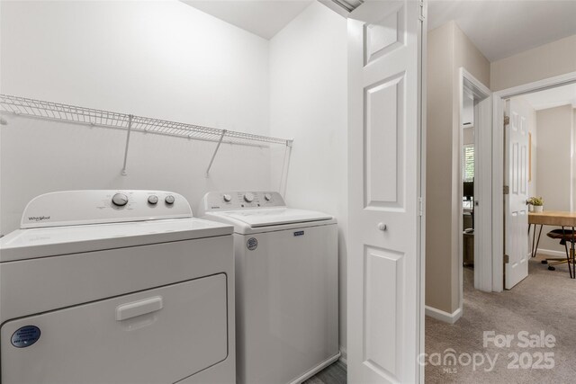9651 Bailey Rd, Cornelius, NC 28031 - laundry room featuring washer and dryer, light colored carpet, and baseboards