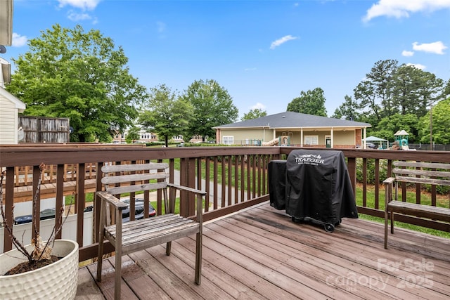 9651 Bailey Rd, Cornelius, NC 28031 - wooden terrace with grilling area and a playground