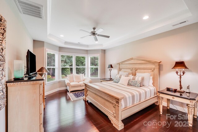 8070 Clems Branch Rd, Indian Land, SC 29707 - bedroom with a tray ceiling, dark wood-style flooring, baseboards, recessed lighting, and ceiling fan
