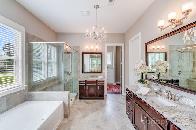8070 Clems Branch Rd, Indian Land, SC 29707 - full bathroom featuring a chandelier, a stall shower, and plenty of natural light