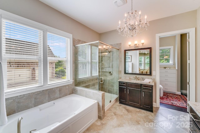 8070 Clems Branch Rd, Indian Land, SC 29707 - bathroom featuring vanity, a garden tub, a shower stall, and a chandelier