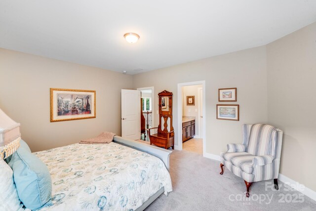 8070 Clems Branch Rd, Indian Land, SC 29707 - bedroom featuring light colored carpet, baseboards, and connected bathroom