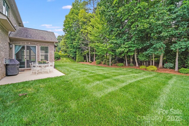 8070 Clems Branch Rd, Indian Land, SC 29707 - view of grassy yard featuring a patio area