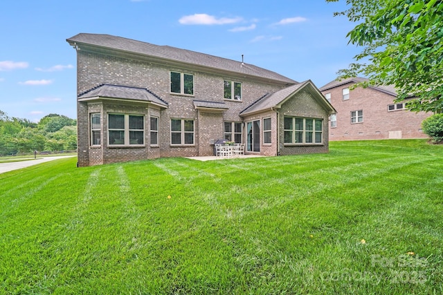 8070 Clems Branch Rd, Indian Land, SC 29707 - back of house with brick siding, a yard, and a patio