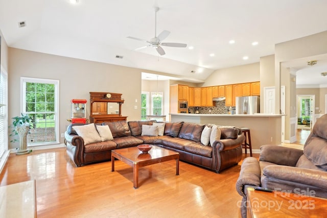 105 Prairie Rose Ct, Waxhaw, NC 28173 - living room with light wood finished floors, ceiling fan, vaulted ceiling, and recessed lighting