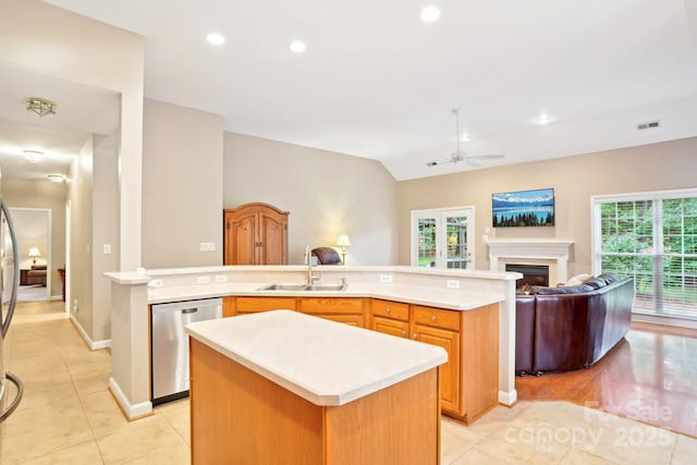 105 Prairie Rose Ct, Waxhaw, NC 28173 - kitchen with dishwasher, a sink, open floor plan, ceiling fan, and light countertops