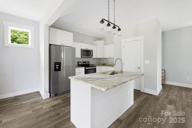156 Mingus Hill Rd, Canton, NC 28716 - kitchen featuring appliances with stainless steel finishes, a sink, white cabinetry, and baseboards
