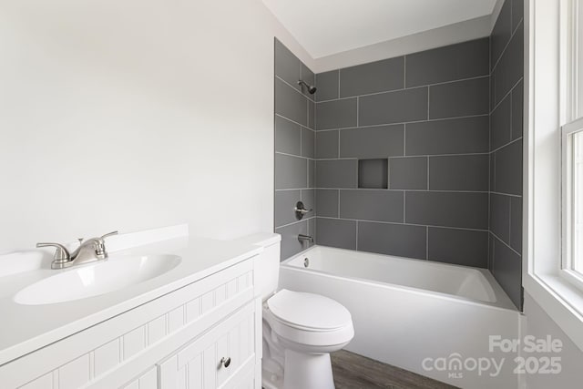 156 Mingus Hill Rd, Canton, NC 28716 - bathroom featuring toilet, washtub / shower combination, vanity, and wood finished floors