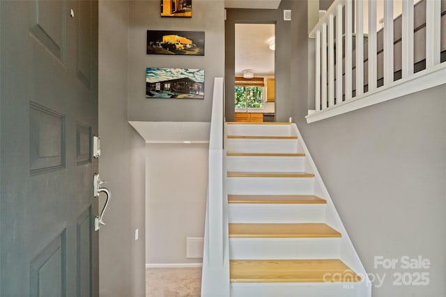 7018 Rollingridge Dr, Charlotte, NC 28211 - staircase featuring baseboards