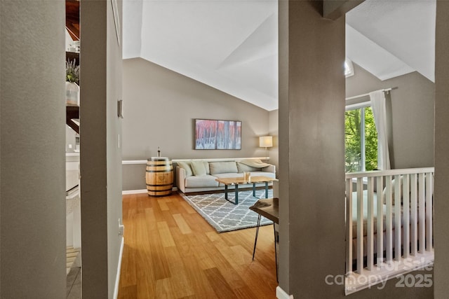 7018 Rollingridge Dr, Charlotte, NC 28211 - hall featuring lofted ceiling and wood finished floors