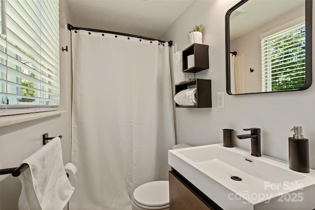 7018 Rollingridge Dr, Charlotte, NC 28211 - bathroom featuring vanity, toilet, and a shower with shower curtain