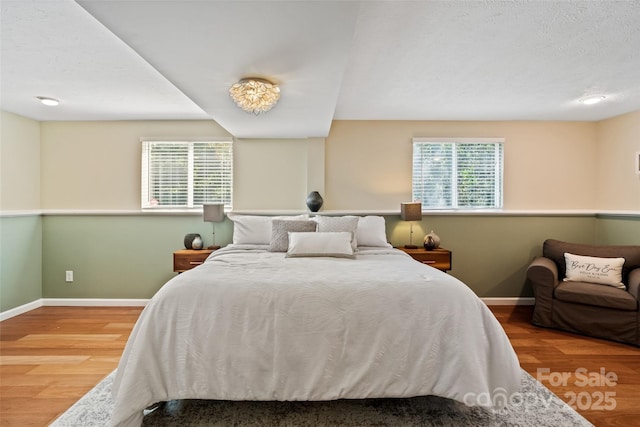 7018 Rollingridge Dr, Charlotte, NC 28211 - bedroom with baseboards and wood finished floors