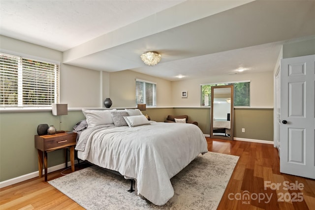 7018 Rollingridge Dr, Charlotte, NC 28211 - bedroom featuring wood finished floors and baseboards