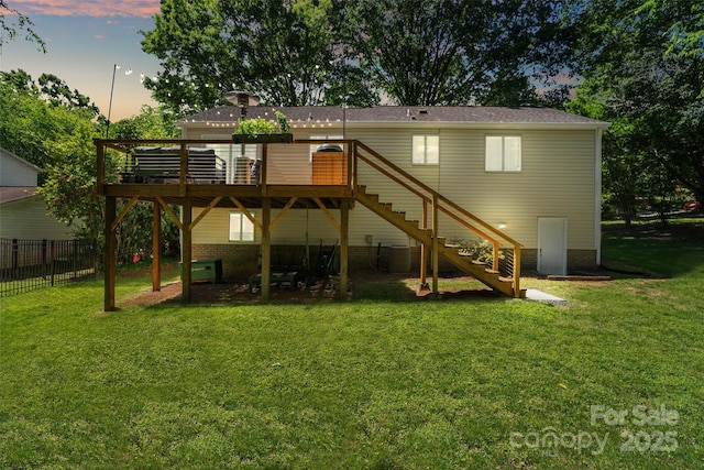 7018 Rollingridge Dr, Charlotte, NC 28211 - back of house at dusk featuring central air condition unit, stairs, and a deck