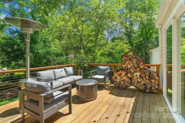 7018 Rollingridge Dr, Charlotte, NC 28211 - deck featuring an outdoor living space and view of wooded area