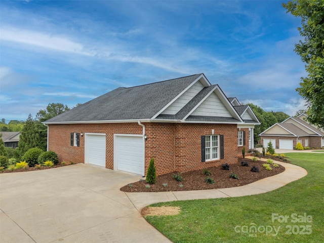 182 Kensington Dr, Forest City, NC 28043 - view of front of property with brick siding, a garage, a front yard, and roof with shingles