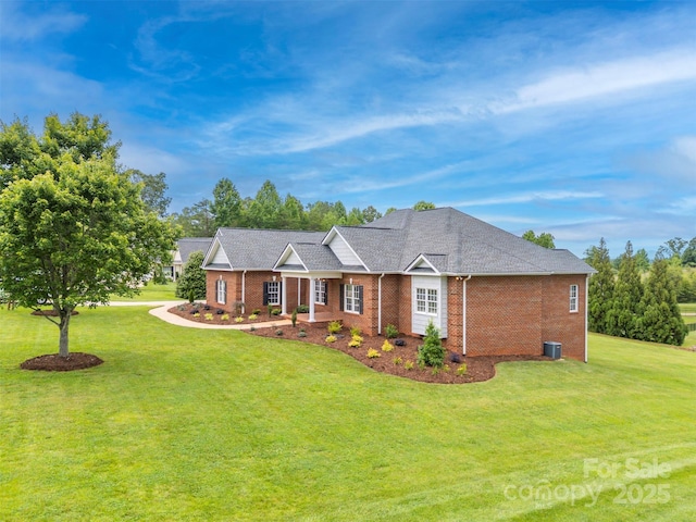 182 Kensington Dr, Forest City, NC 28043 - view of front of home featuring a front lawn, brick siding, and central AC unit