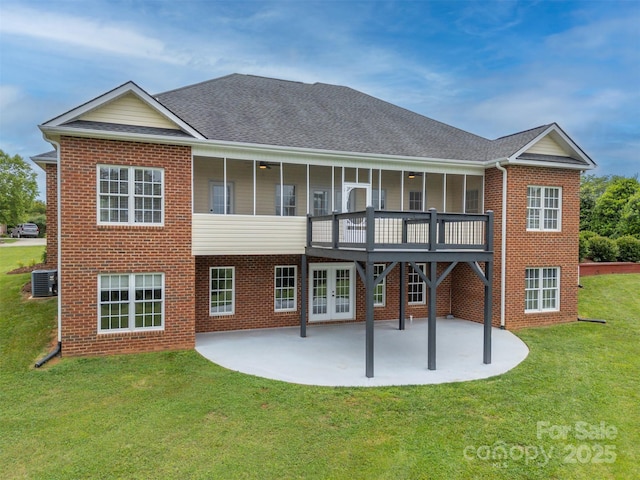 182 Kensington Dr, Forest City, NC 28043 - back of property with a patio area, french doors, brick siding, central AC, and a yard